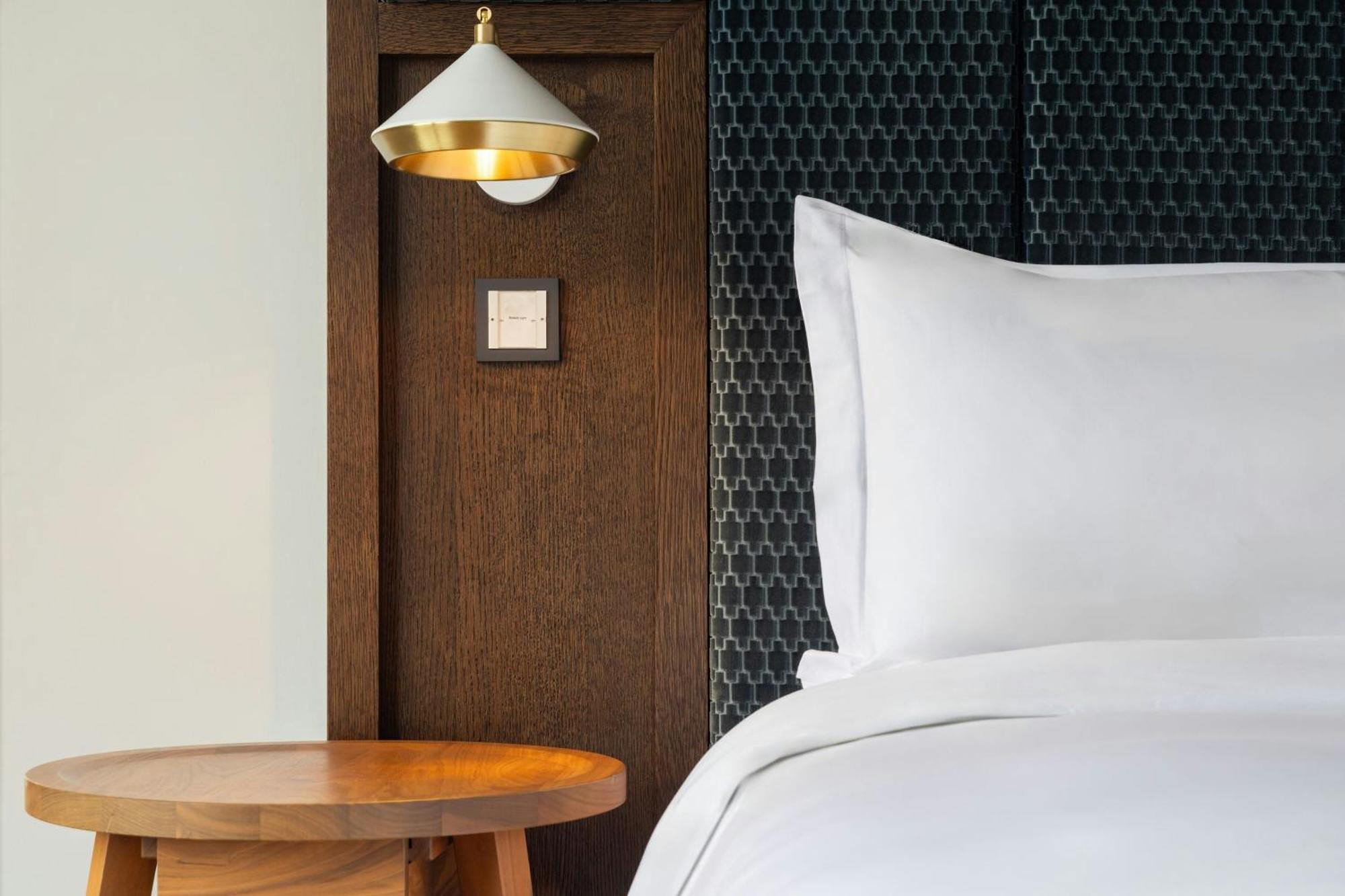 Studio mit Doppelbett und Stadtblick